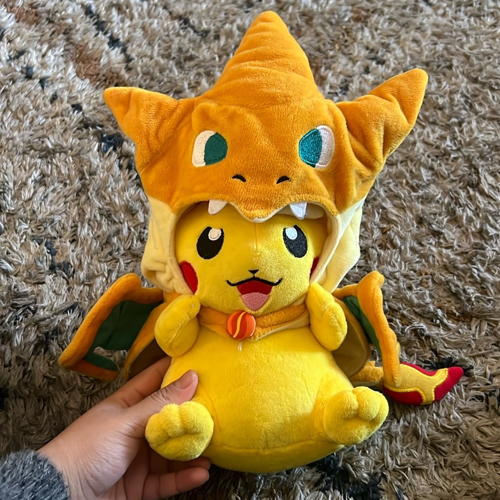 Pikachu with a Charizard Costume